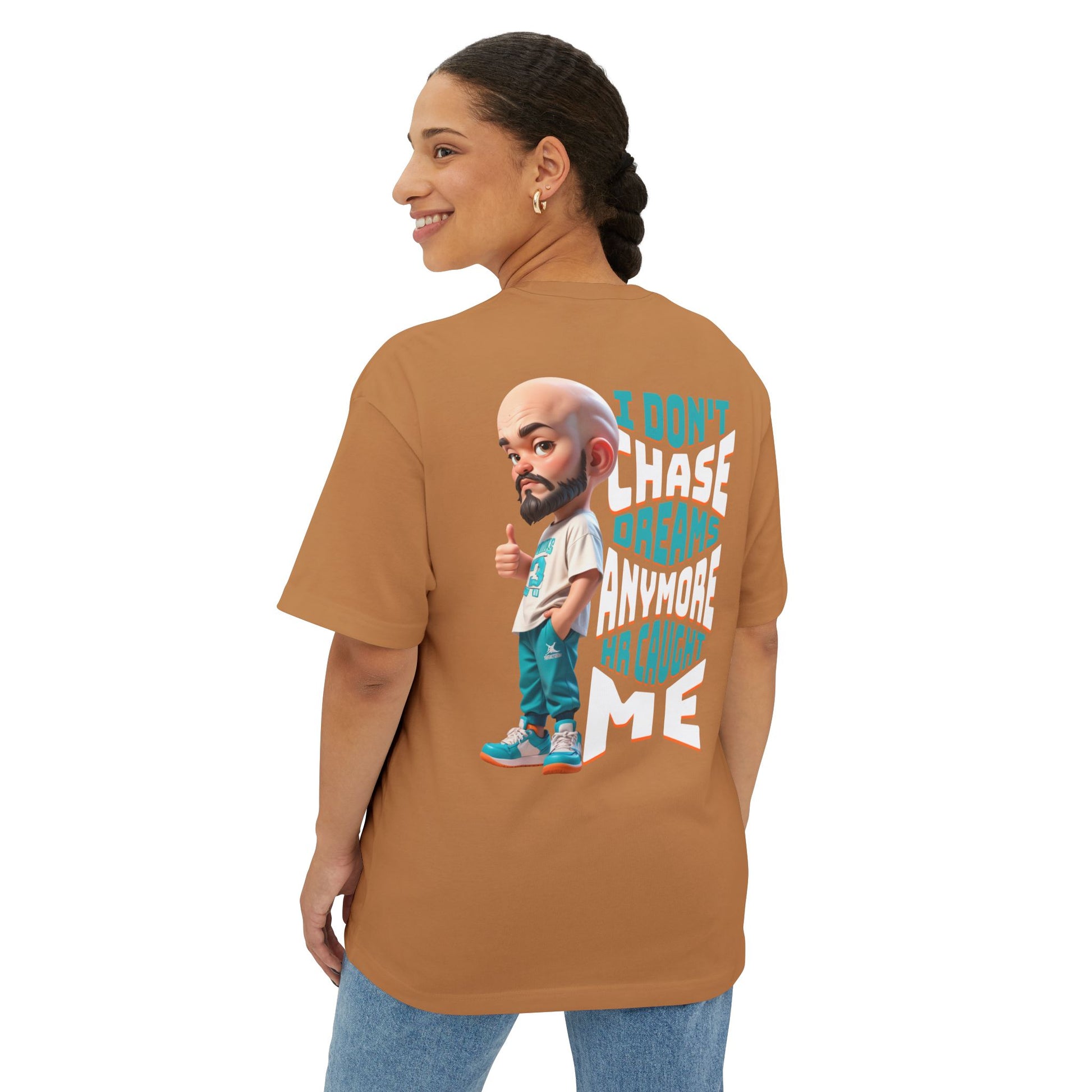 Person wearing a brown t-shirt with a graphic and text on the back