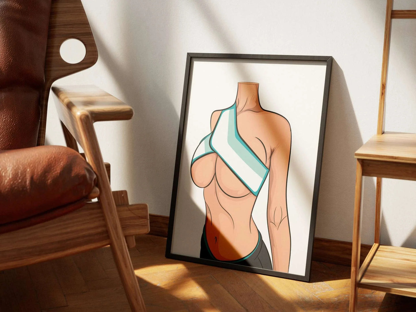 Model 22 Baked Art print in a modern athletic top, displayed in a frame on a wooden floor.