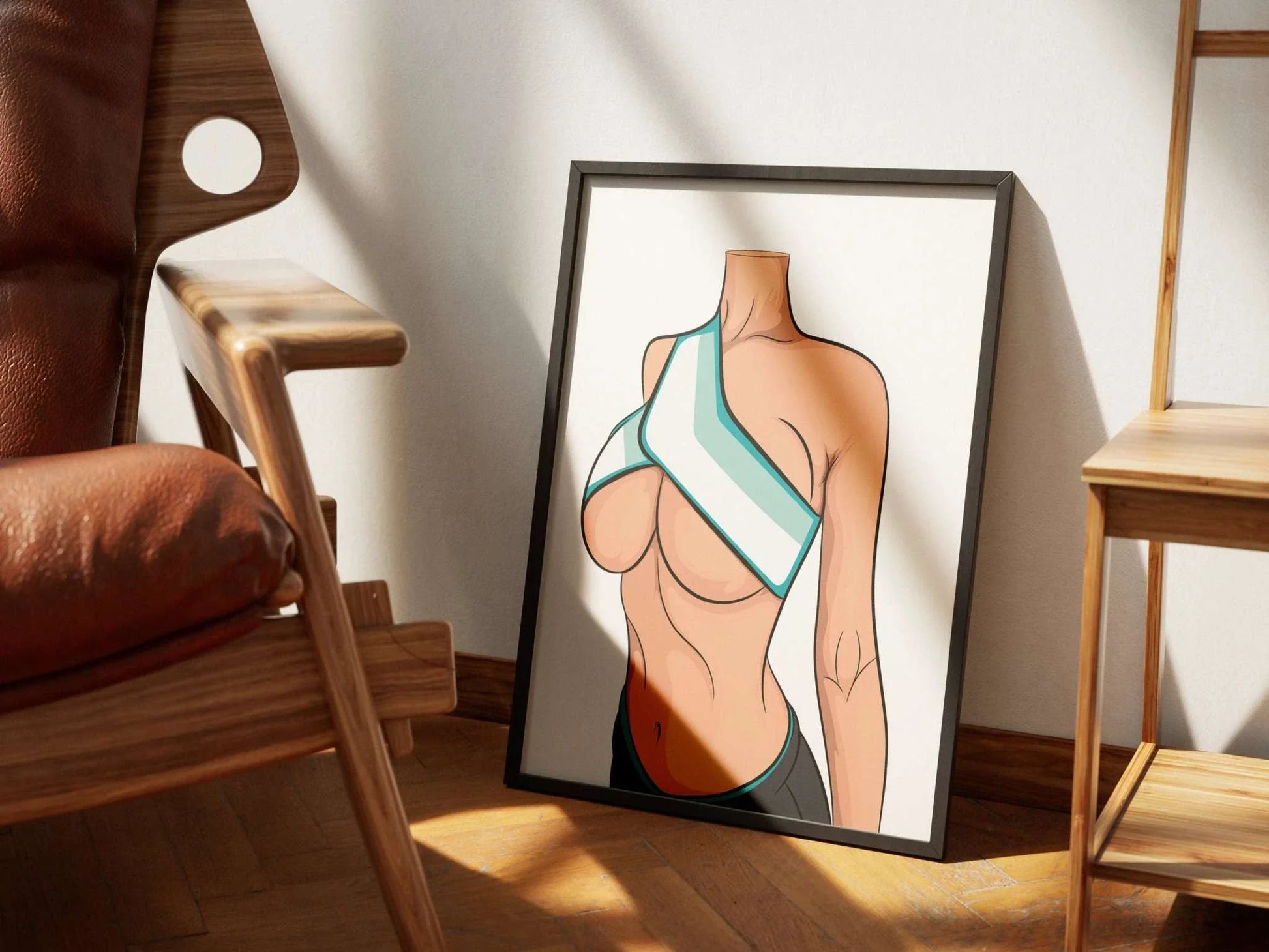 Model 22 Baked Art print in a modern athletic top, displayed in a frame on a wooden floor.