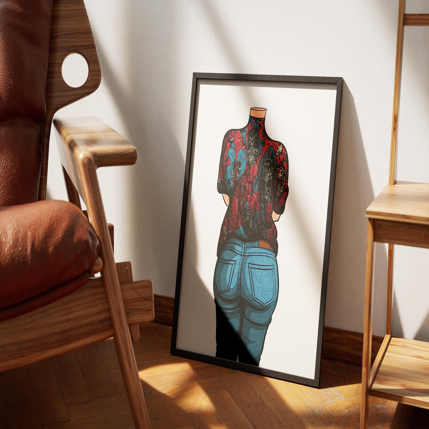 Framed skull-themed denim art print, vibrant red and blue hues, bold streetwear style.