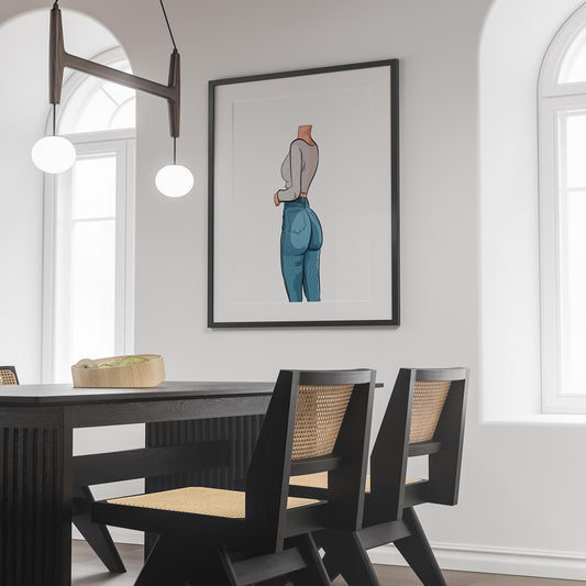 Framed artwork of a model in high-waisted jeans and crop top, titled "Baked Art - Jeans Denim Model 69", displayed in a modern dining room.