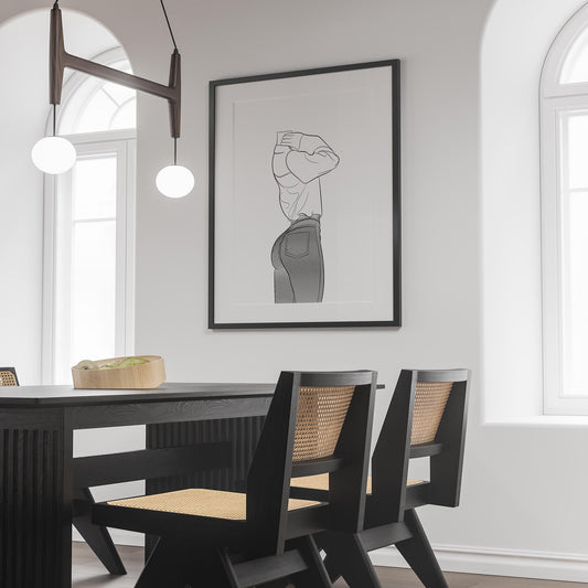Line art illustration of a character in fitted denim jeans and loose sweatshirt, Jeans Denim - Line Model Art 28, framed on a wall in a modern dining room.