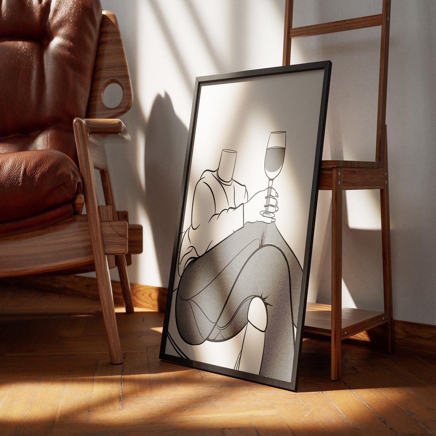 Line art of a person in jeans and sweater holding a wine glass, framed art on wooden floor.