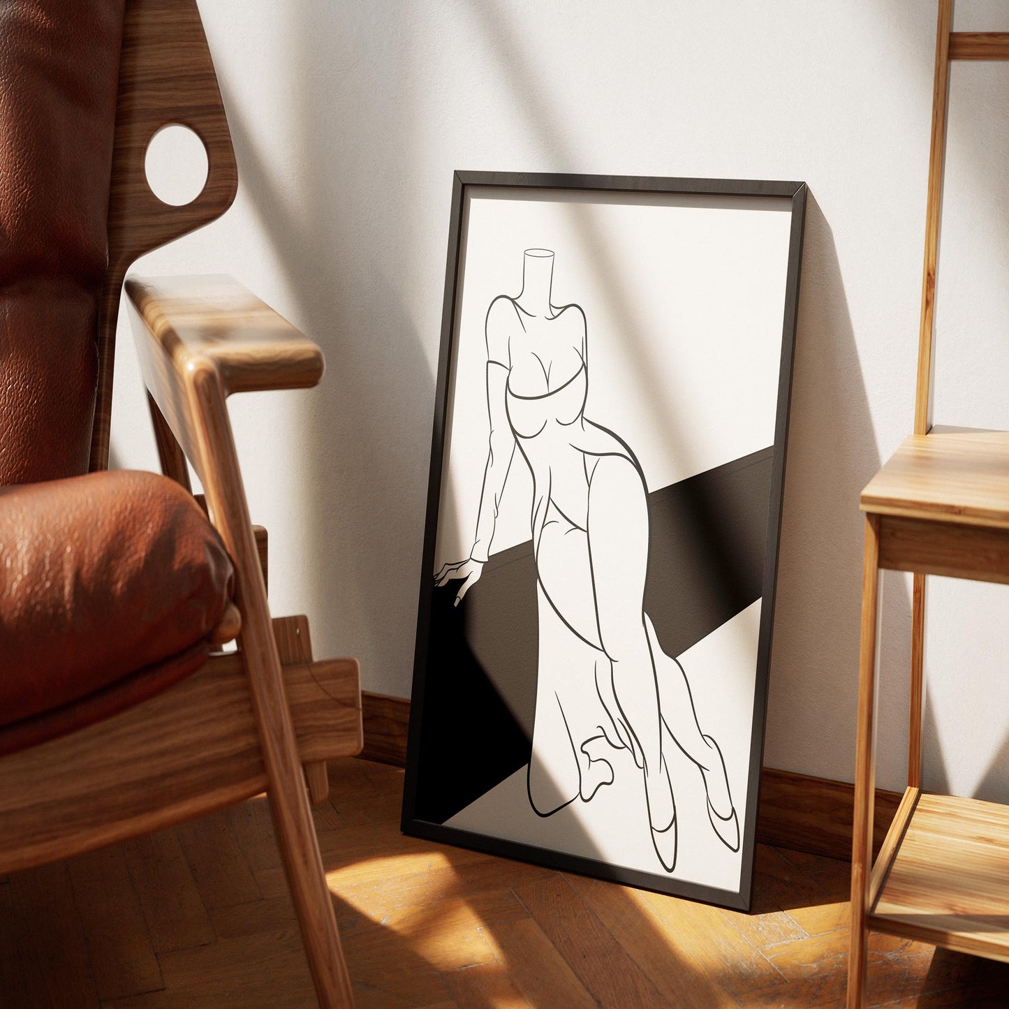 Line art depicting off-shoulder dress, framed, leaning against wall; ideal for art lovers and designers.