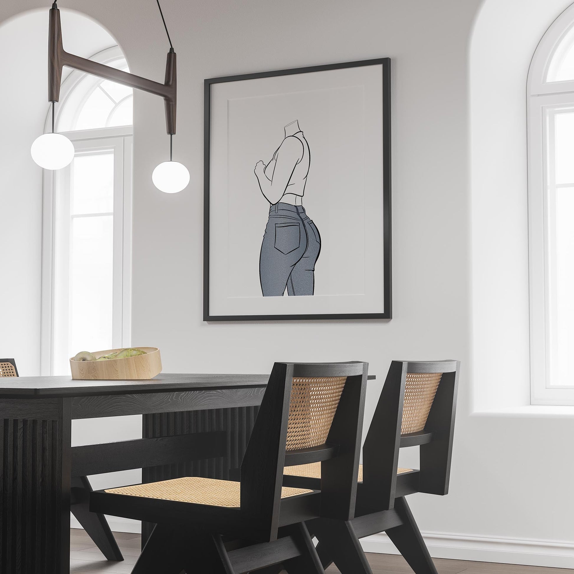 Line art artwork of a figure in blue denim jeans and sleeveless top on a wall in modern dining room.