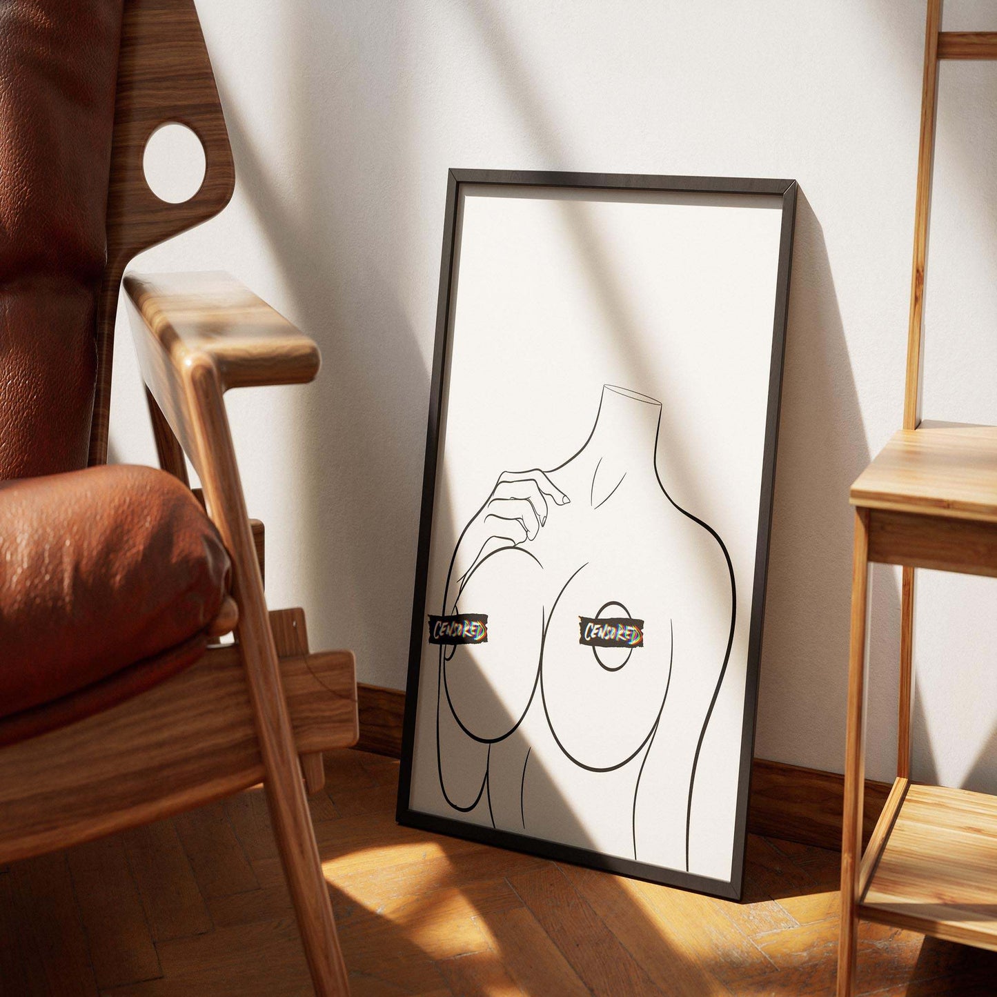 Bold NSFW Model 26 - Line Art digital print with censored labels, pop art style, framed and leaning against a wall.