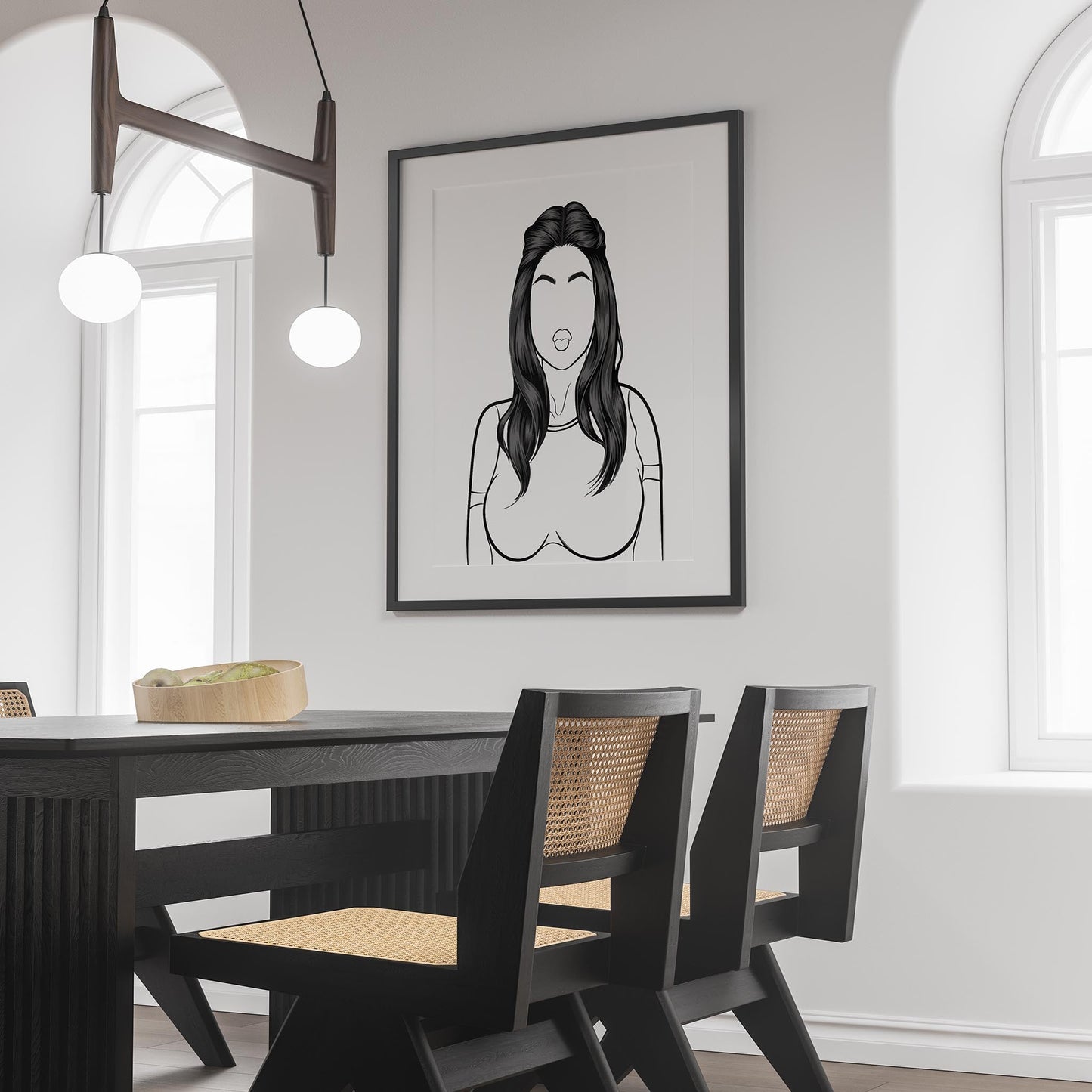 Character & human faces model 18 line art framed on wall in modern dining room.
