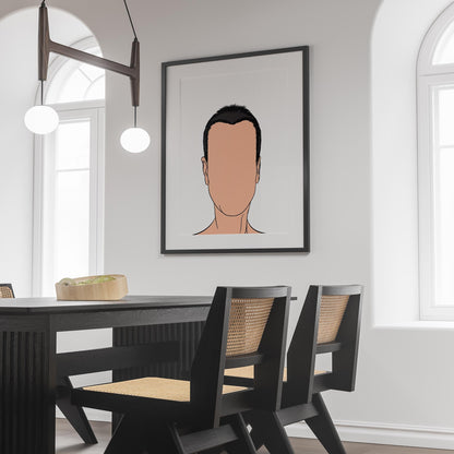 Minimalist art print depicting faceless character on wall of modern dining room.