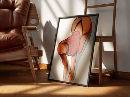 Digital art print featuring abstract lingerie model in vibrant colors, framed and leaning against a chair; Baked Art - Model 63.